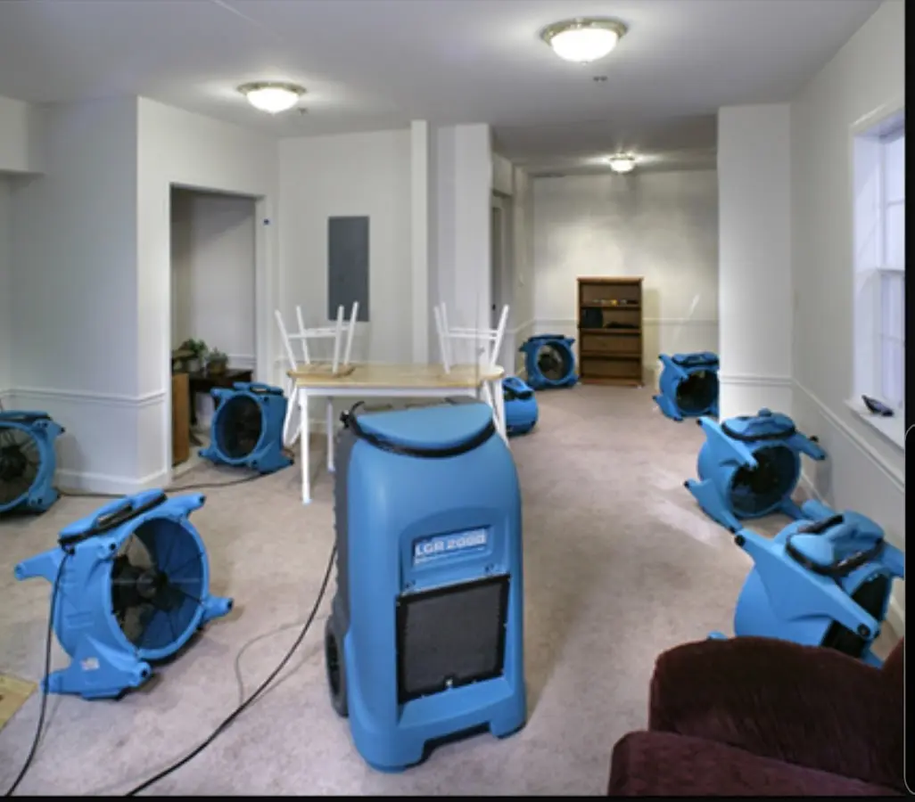 Air movers and dehumidifier setup for Water Damage Restoration in Champion Heights